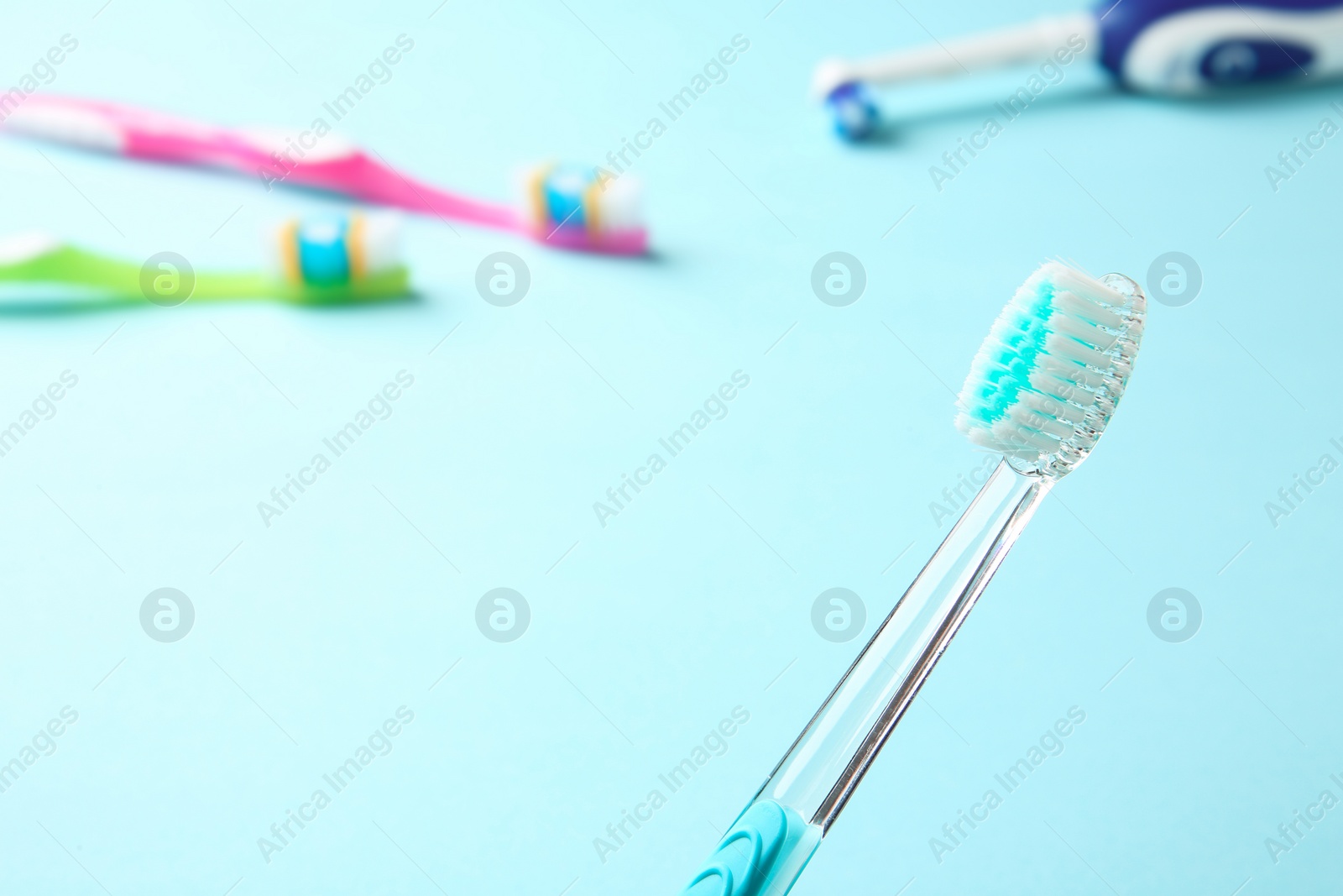 Photo of Manual toothbrush on color background. Dental care