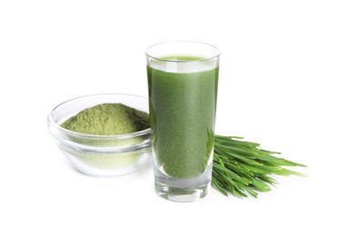 Photo of Wheat grass drink in shot glass, fresh sprouts and bowl of green powder isolated on white