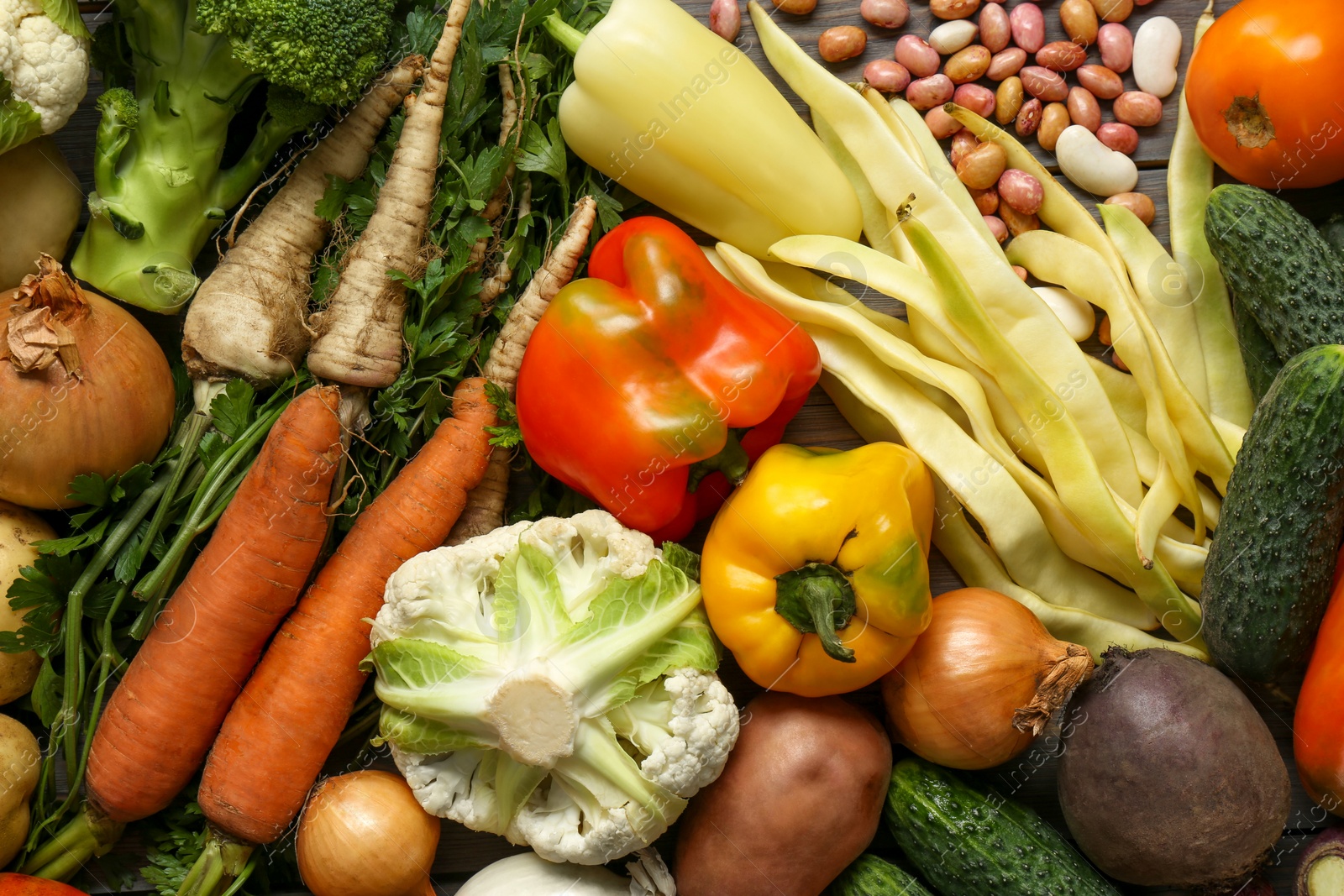 Photo of Different fresh vegetables as background, top view. Farmer harvesting