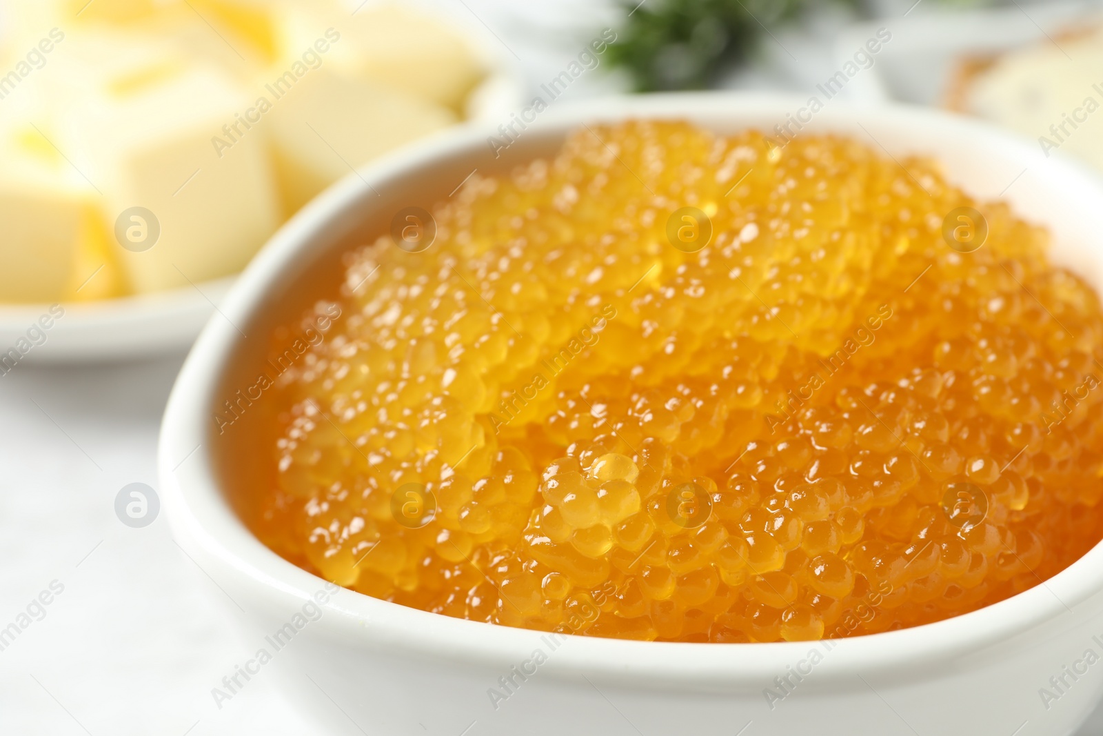 Photo of Fresh pike caviar in bowl on table, closeup