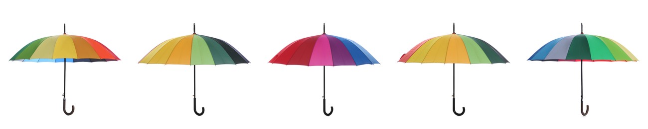 Image of Set with different colorful umbrellas on white background. Banner design