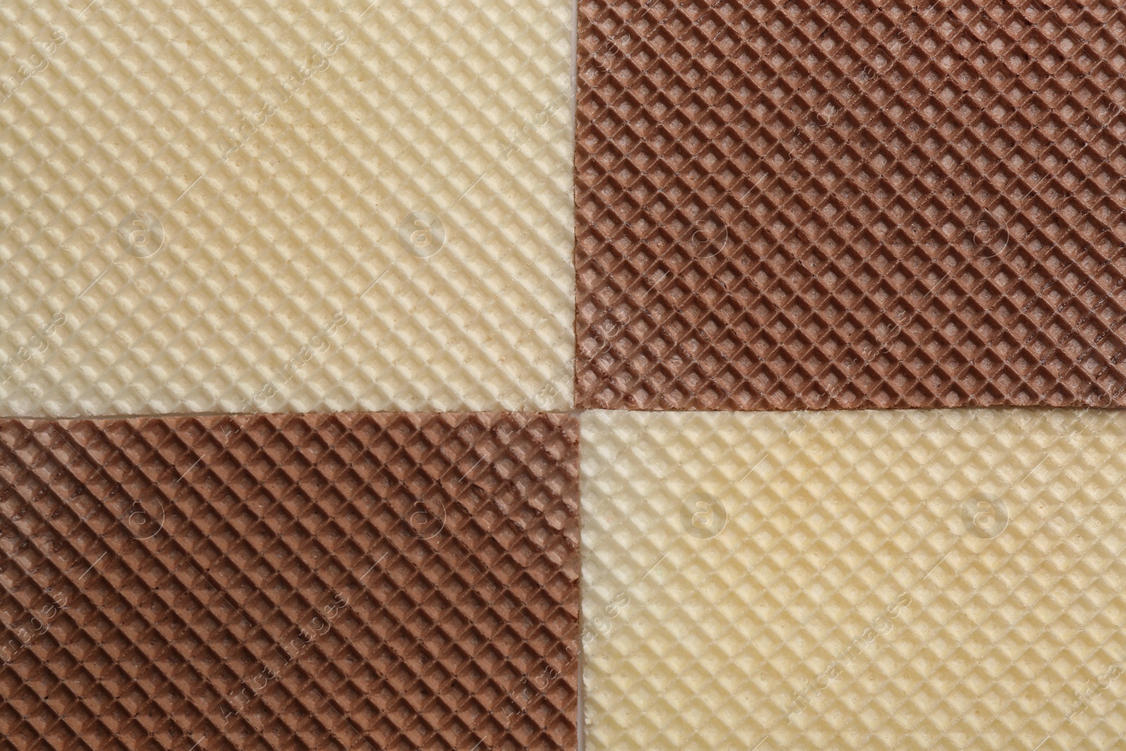 Photo of Tasty wafers as background, top view. Crispy food