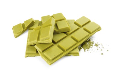 Photo of Pieces of tasty matcha chocolate bar and powder isolated on white