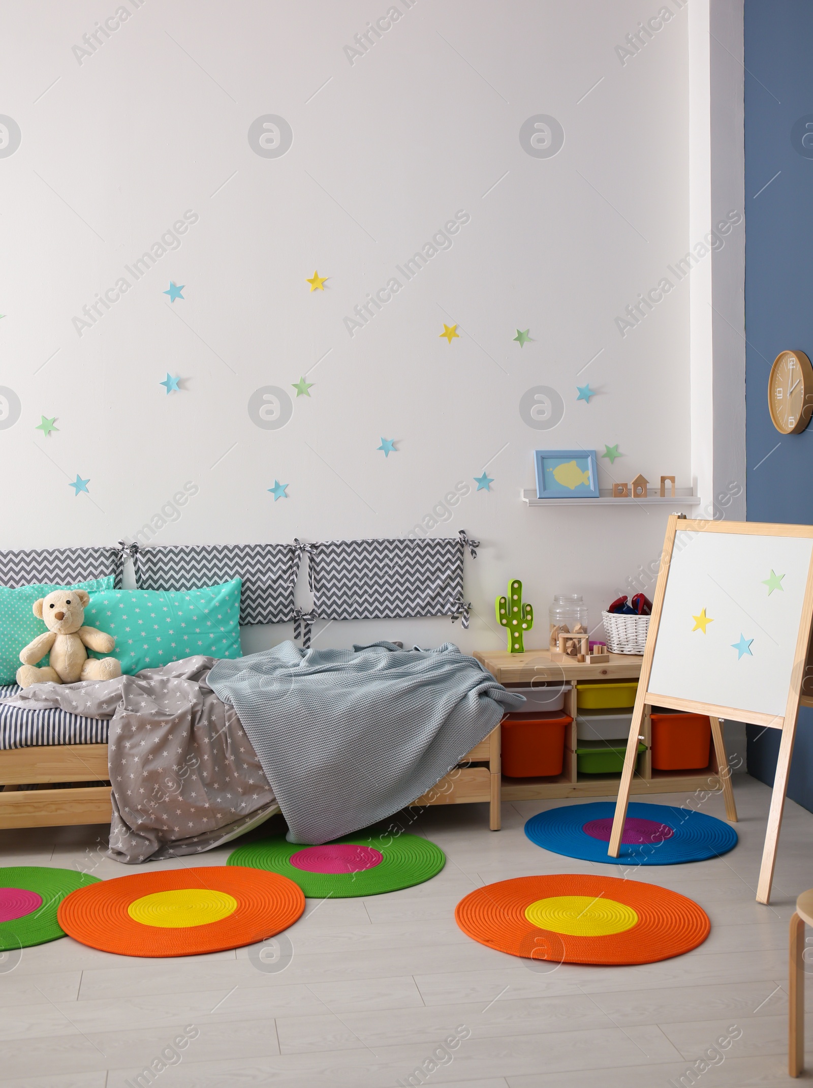 Photo of Modern child room interior with comfortable bed