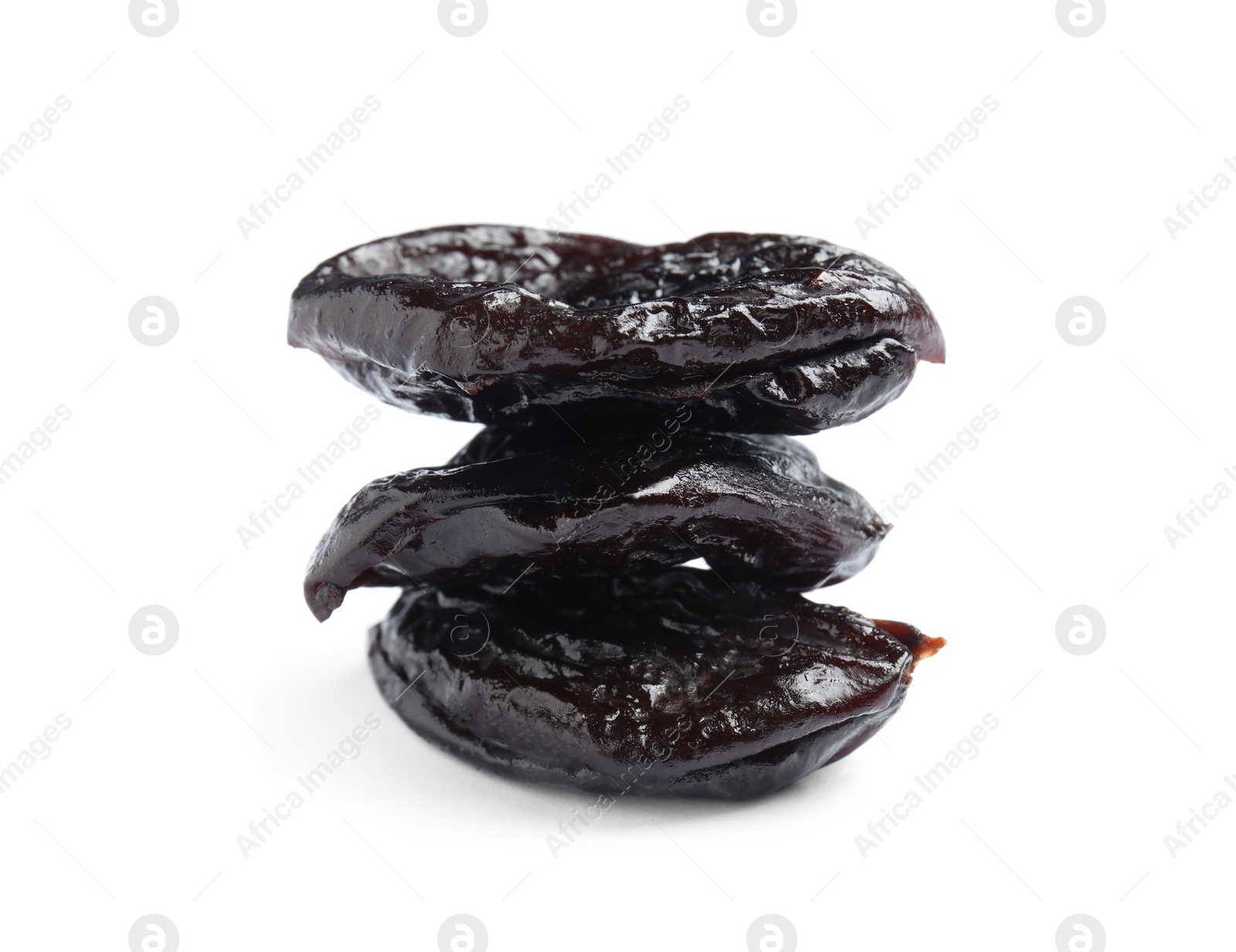 Photo of Tasty prunes on white background. Dried fruit as healthy snack