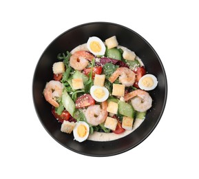 Photo of Bowl of delicious Caesar salad with shrimps isolated on white, top view