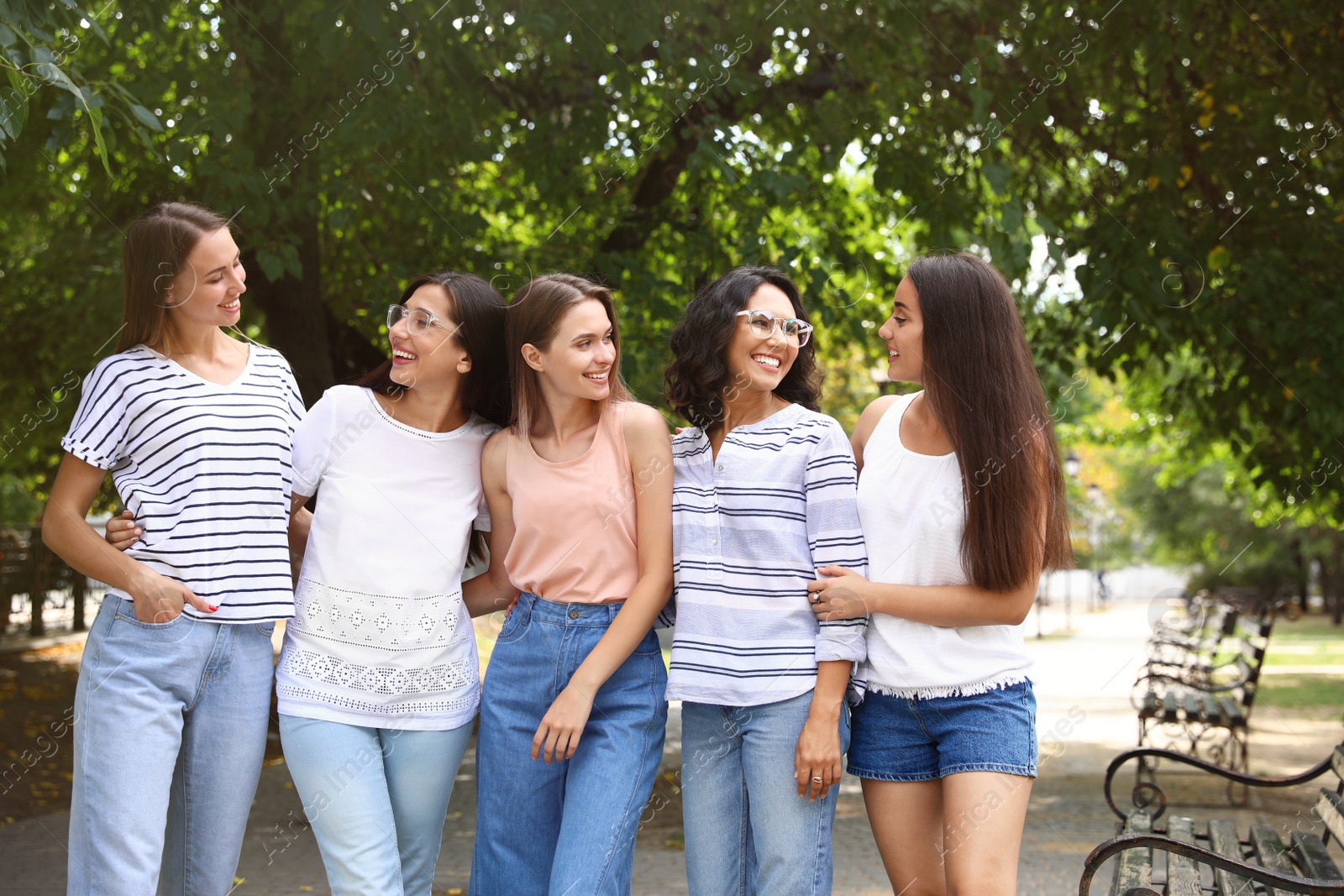 Photo of Happy women outdoors on sunny day. Girl power concept