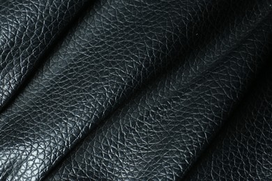 Photo of Black natural leather as background, above view