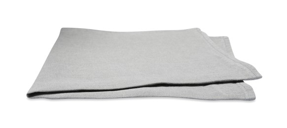 Photo of Grey folded fabric napkin on white background