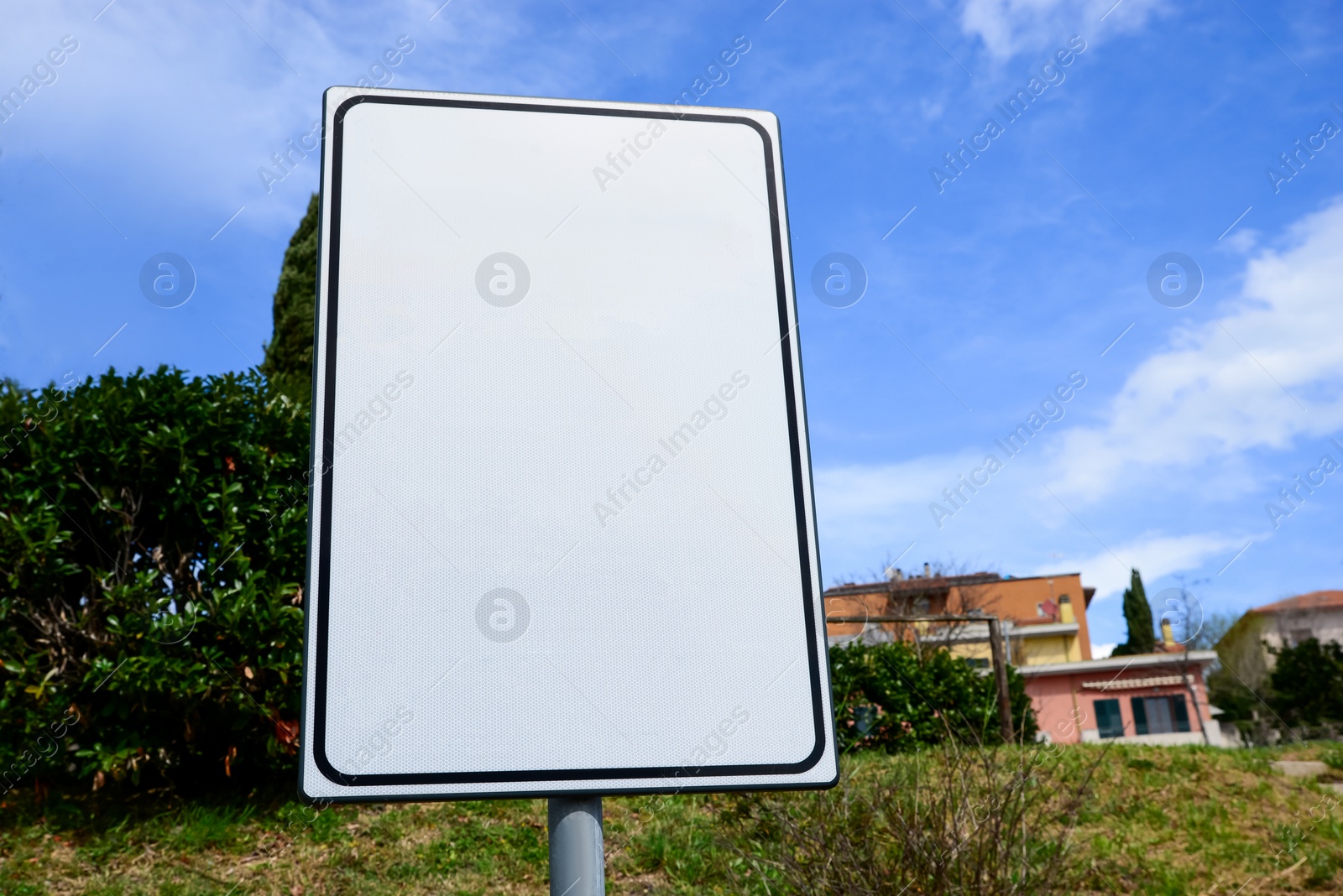 Photo of Blank advertising board in park. Mockup for design