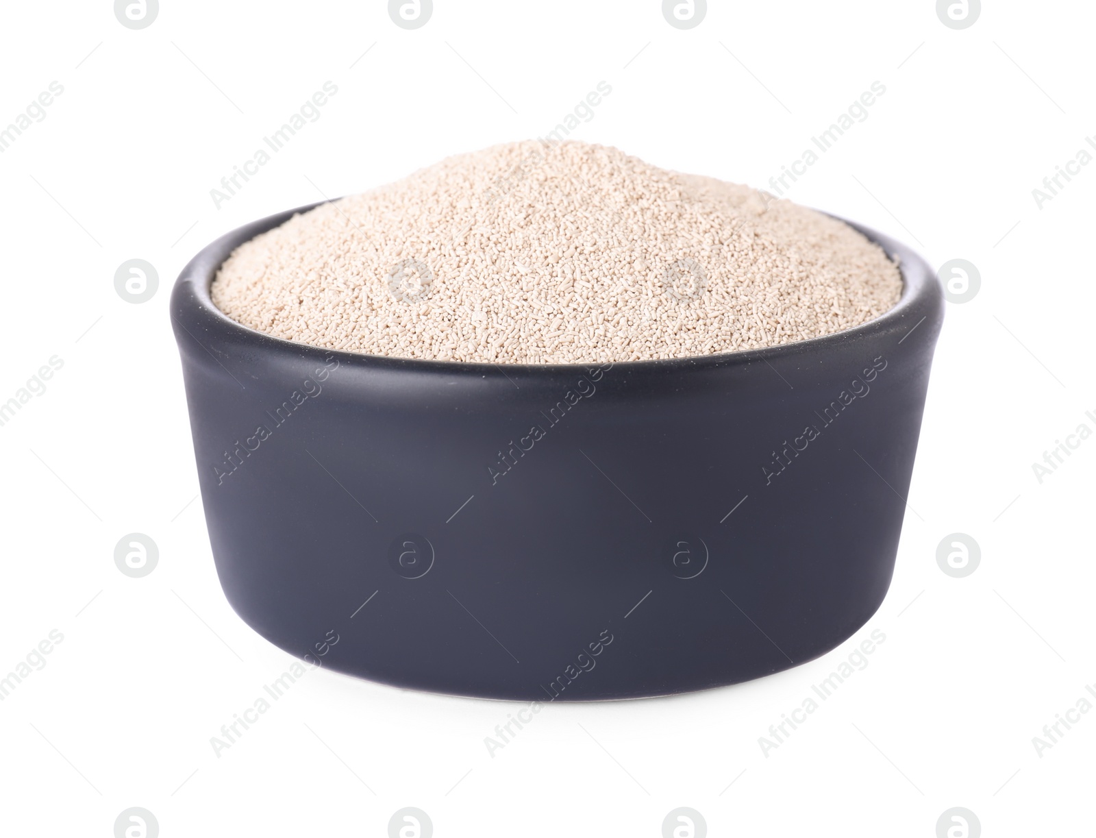 Photo of Bowl of active dry yeast isolated on white