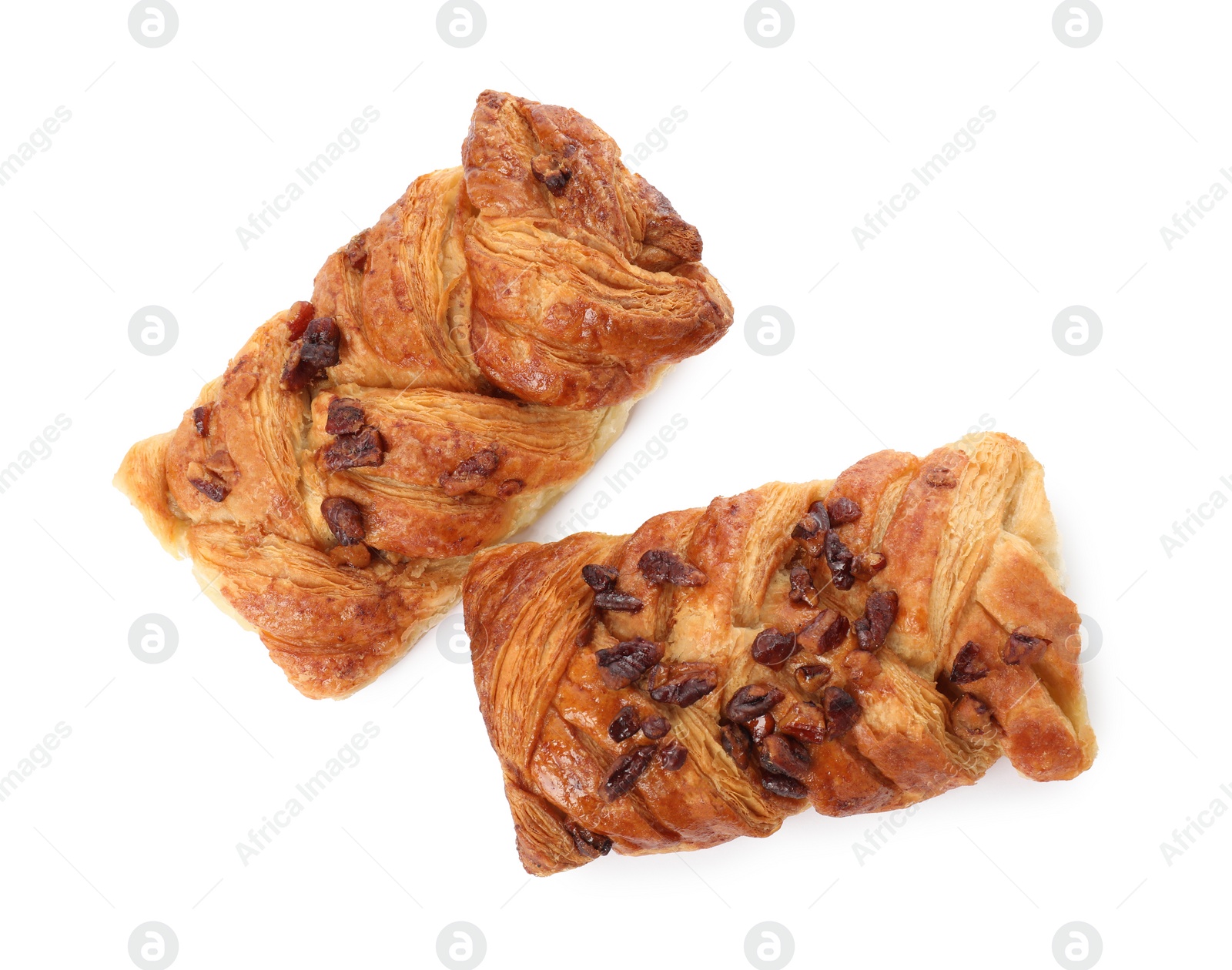 Photo of Tasty sweet buns with raisins isolated on white, top view. Fresh pastries