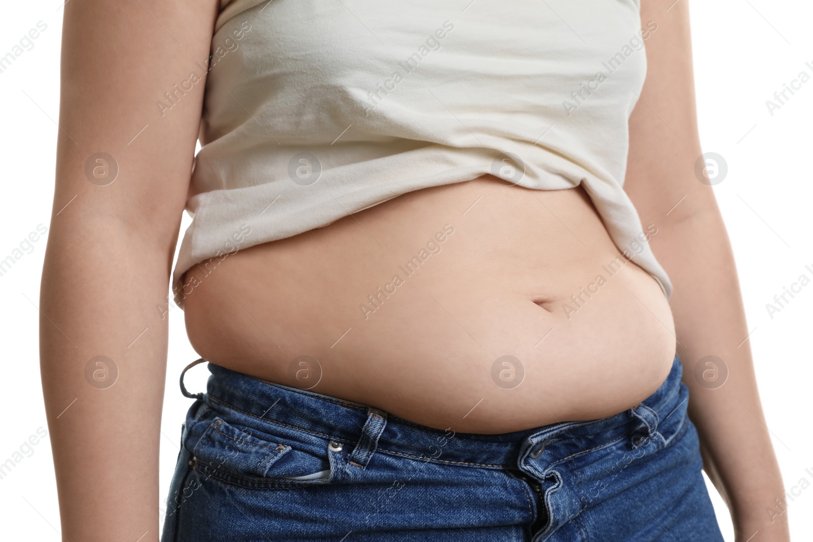 Photo of Woman with excessive belly fat on white background, closeup. Overweight problem