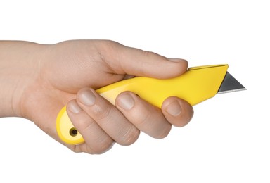 Photo of Man holding utility knife on white background, closeup