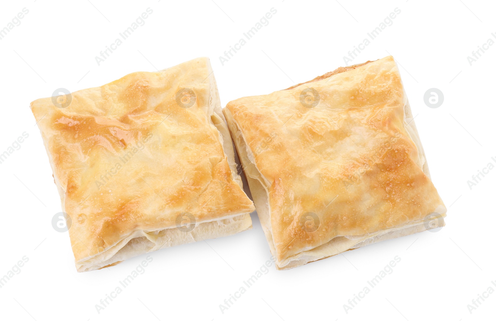 Photo of Delicious fresh puff pastries isolated on white, top view