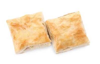 Delicious fresh puff pastries isolated on white, top view