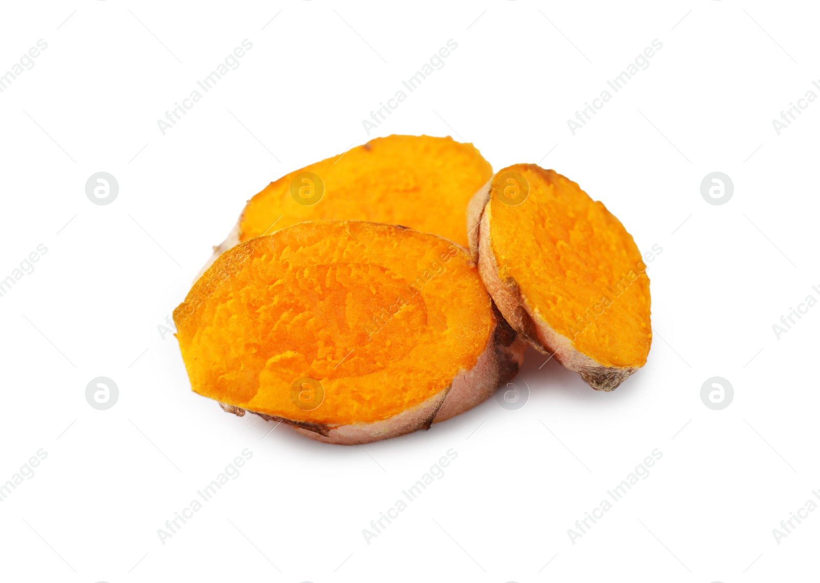 Photo of Slices of fresh turmeric root isolated on white