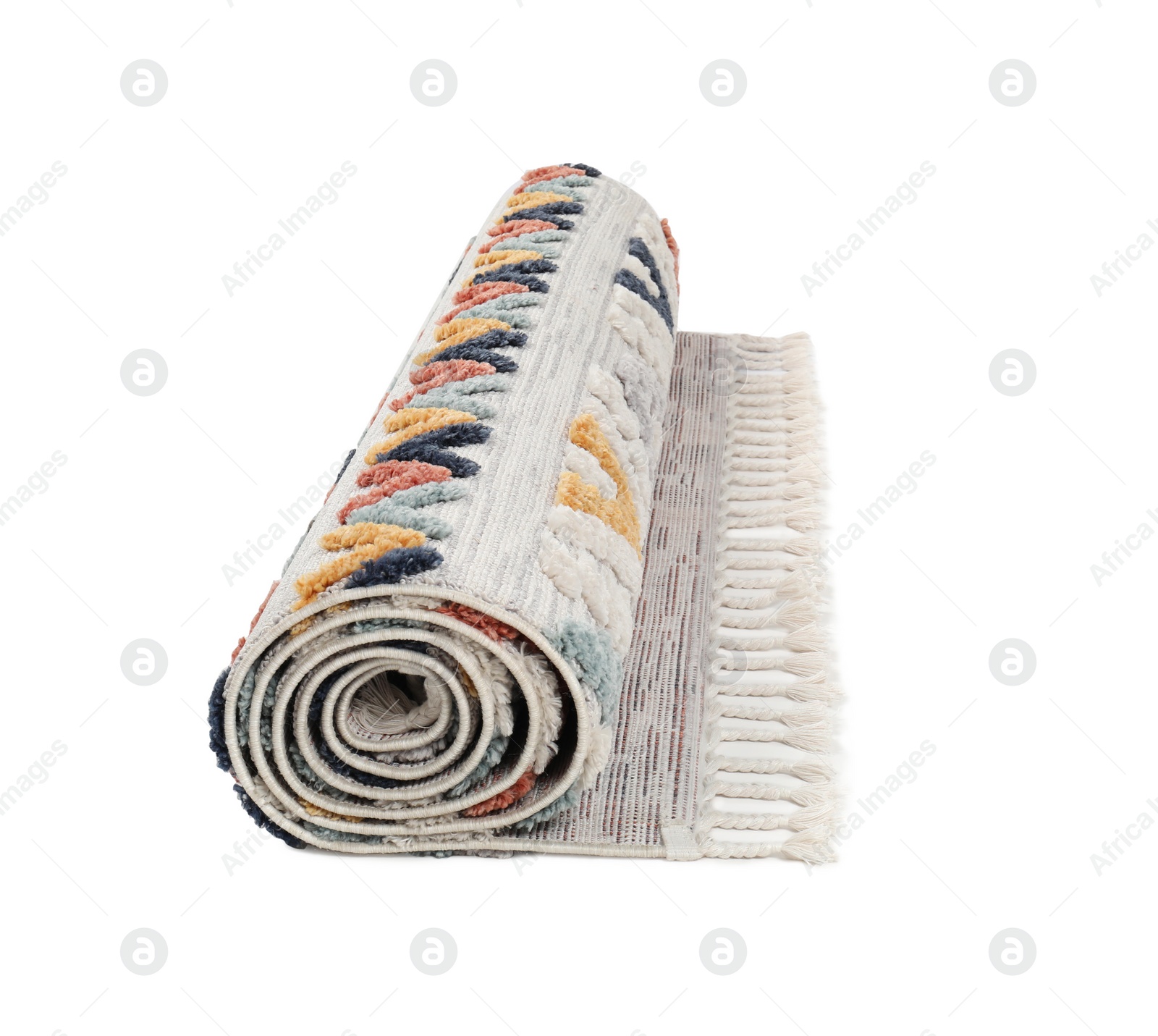 Photo of Rolled carpet with pattern on white background. Interior element