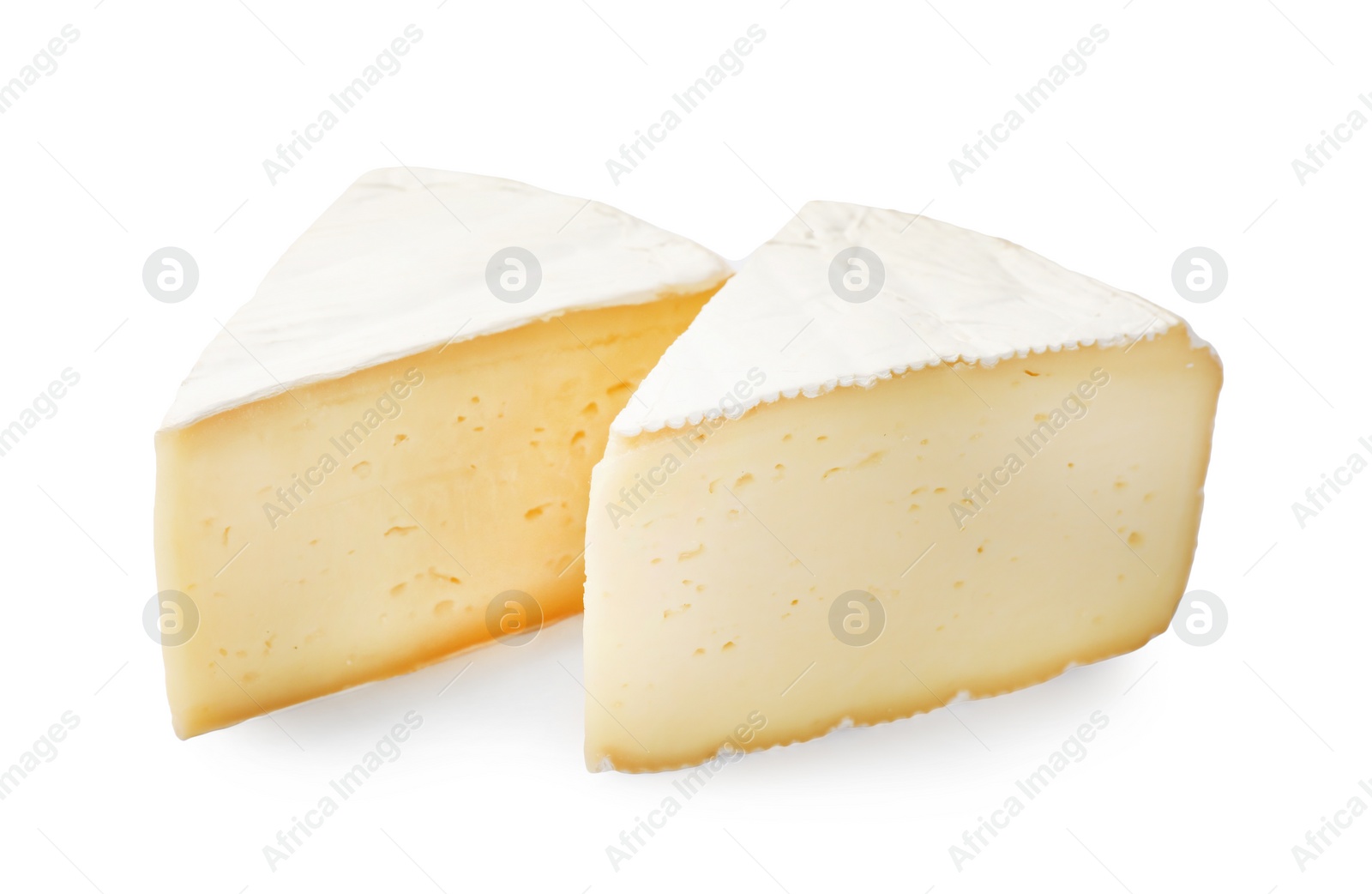 Photo of Pieces of tasty camembert cheese isolated on white