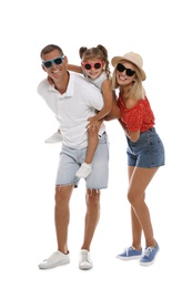 Photo of Happy family with child wearing sunglasses on white background