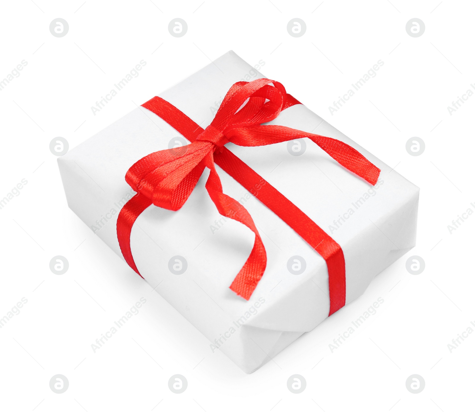 Photo of Beautiful gift box with red bow isolated on white