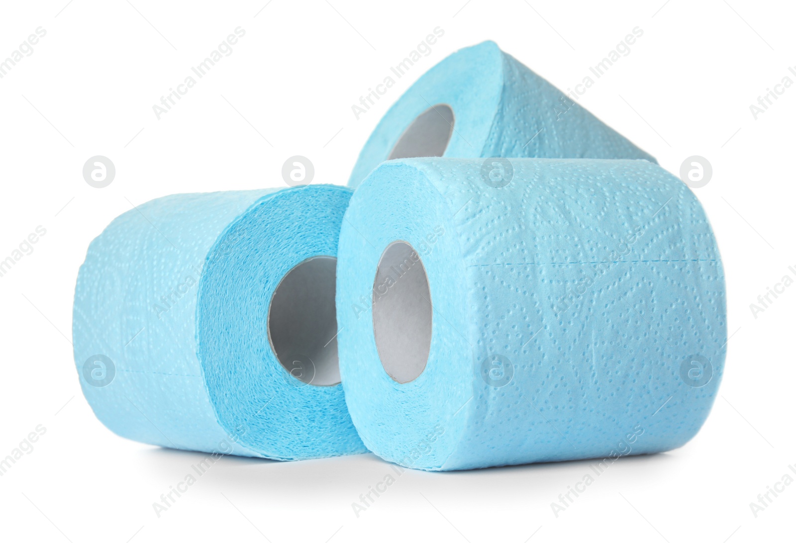 Photo of Color toilet paper rolls on white background