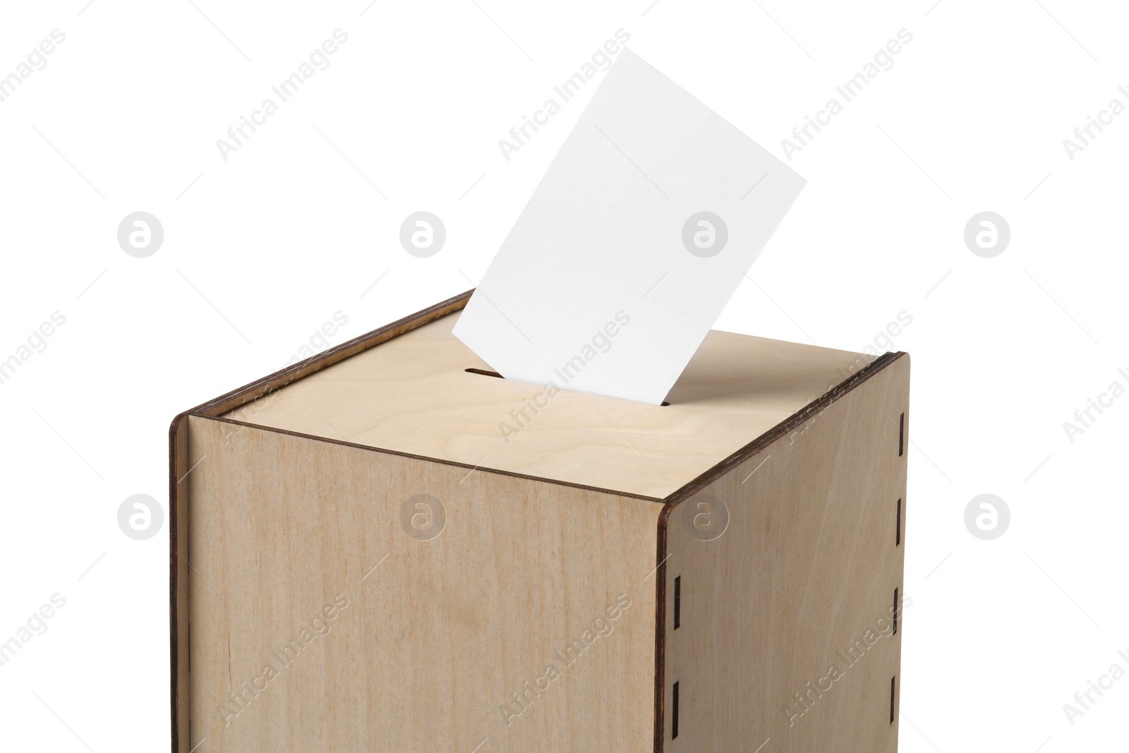 Photo of Wooden ballot box with vote isolated on white