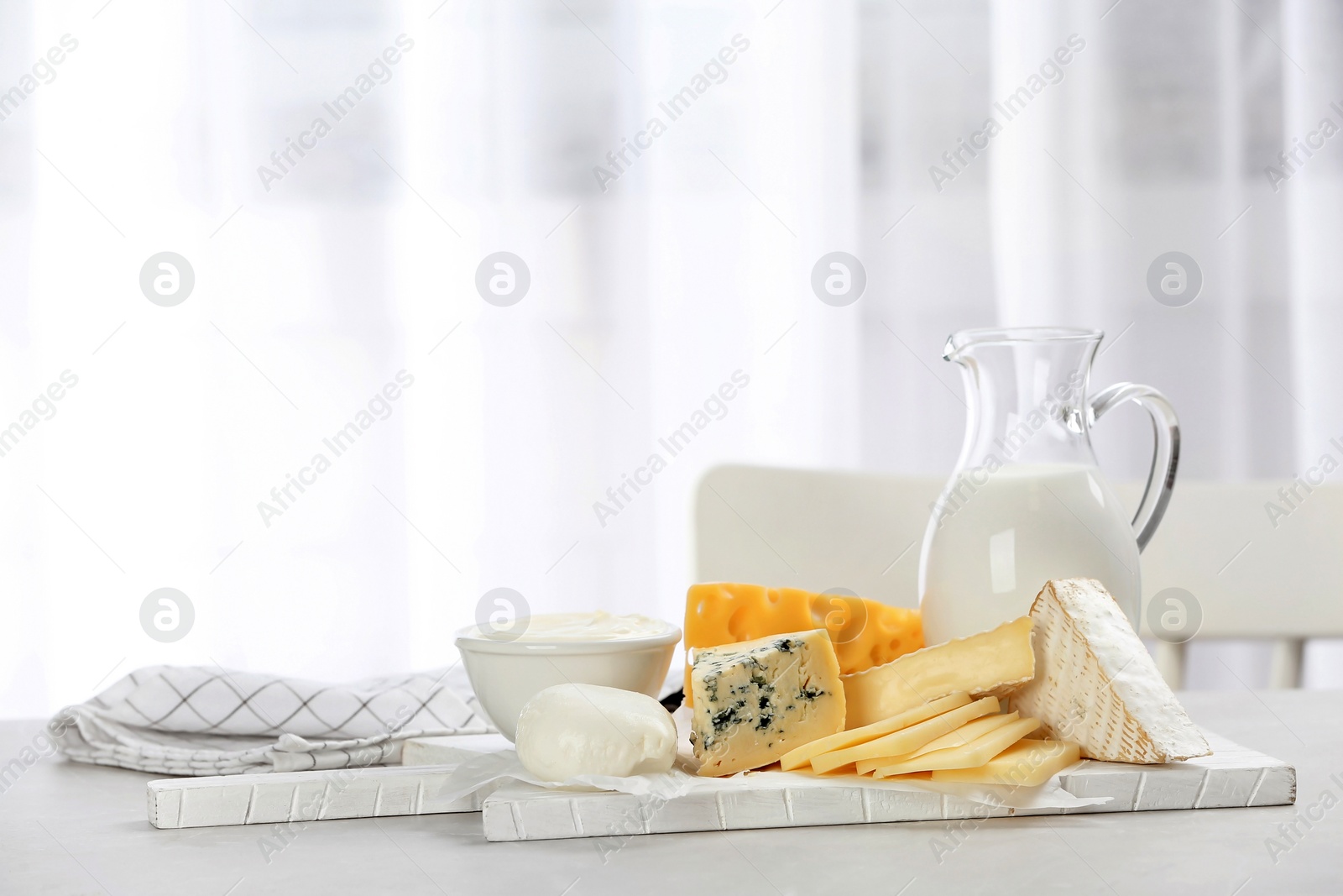 Photo of Different dairy products on table