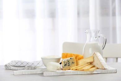 Different dairy products on table