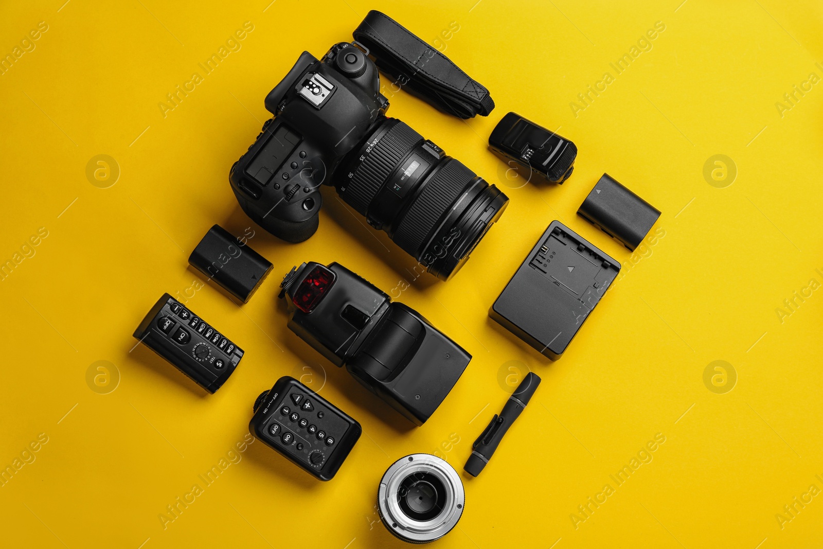 Photo of Flat lay composition with photographer's equipment and accessories on color background