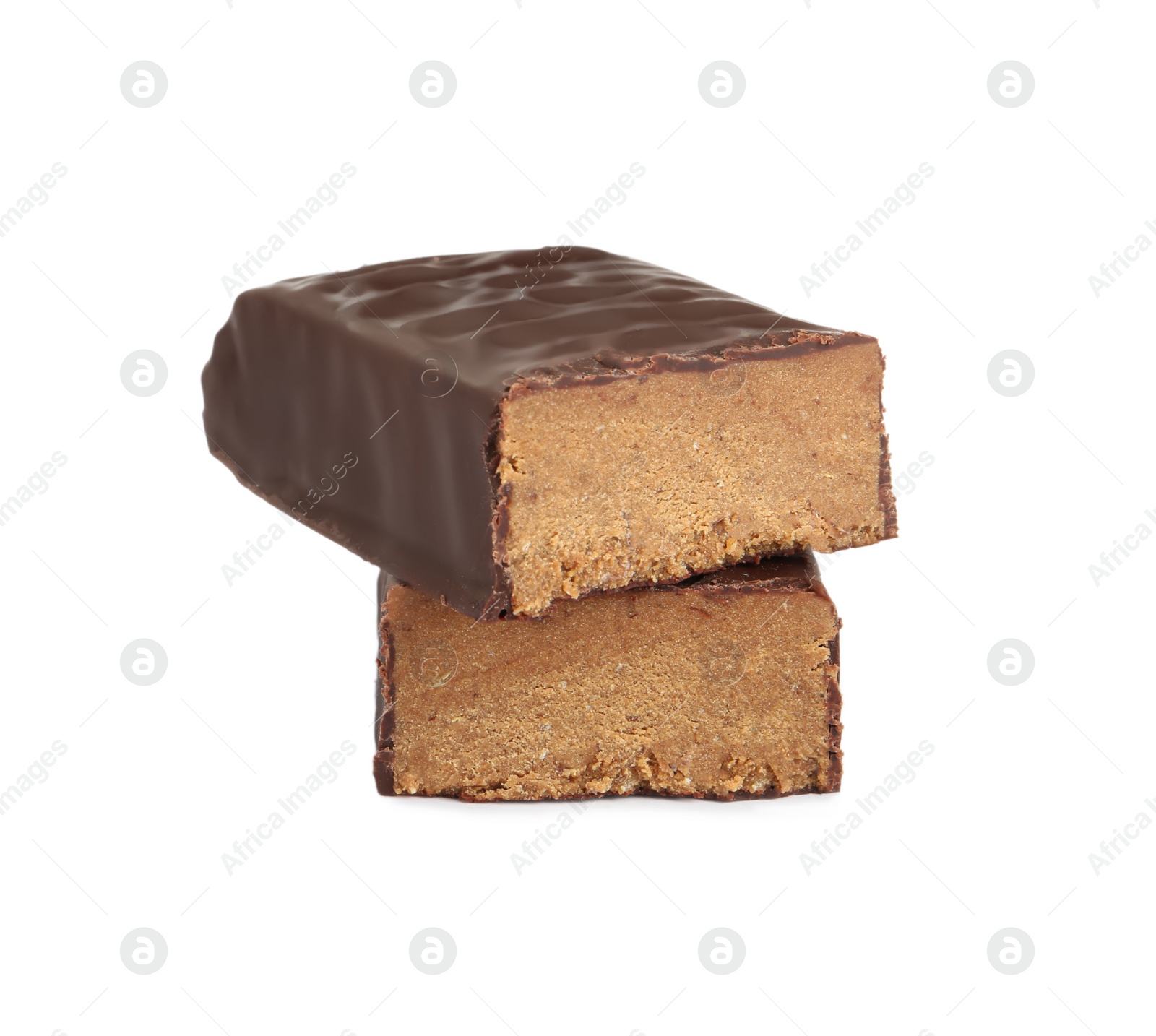 Photo of Halves of tasty chocolate glazed protein bar on white background