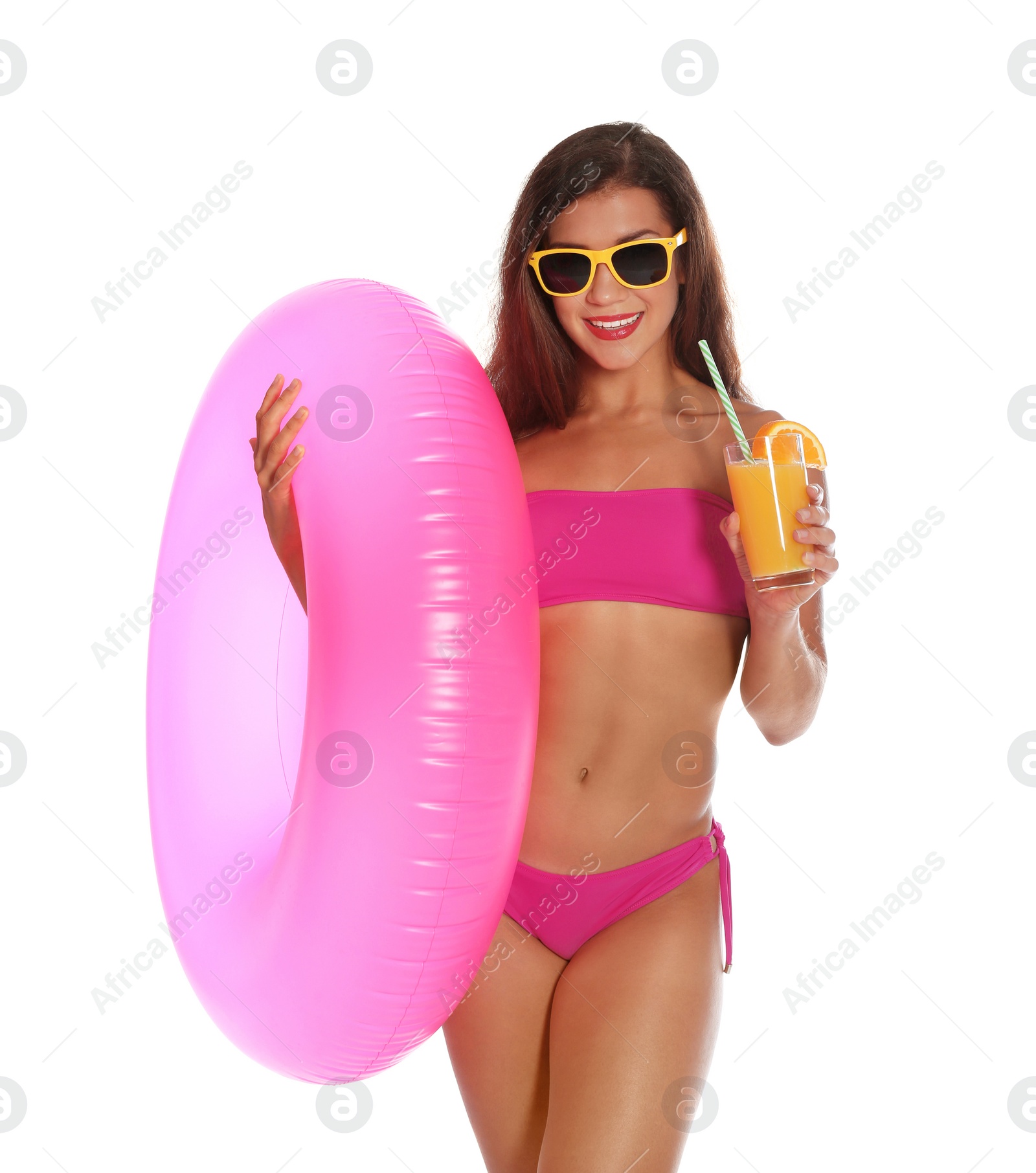 Photo of Beautiful young woman with inflatable ring and glass of cocktail on white background