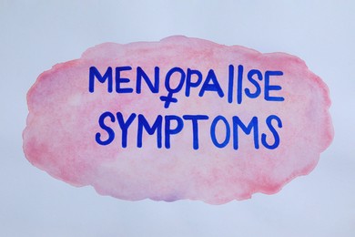 Photo of Words Menopause Symptoms written on white background, top view