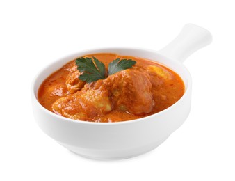 Photo of Bowl of delicious chicken curry on white background