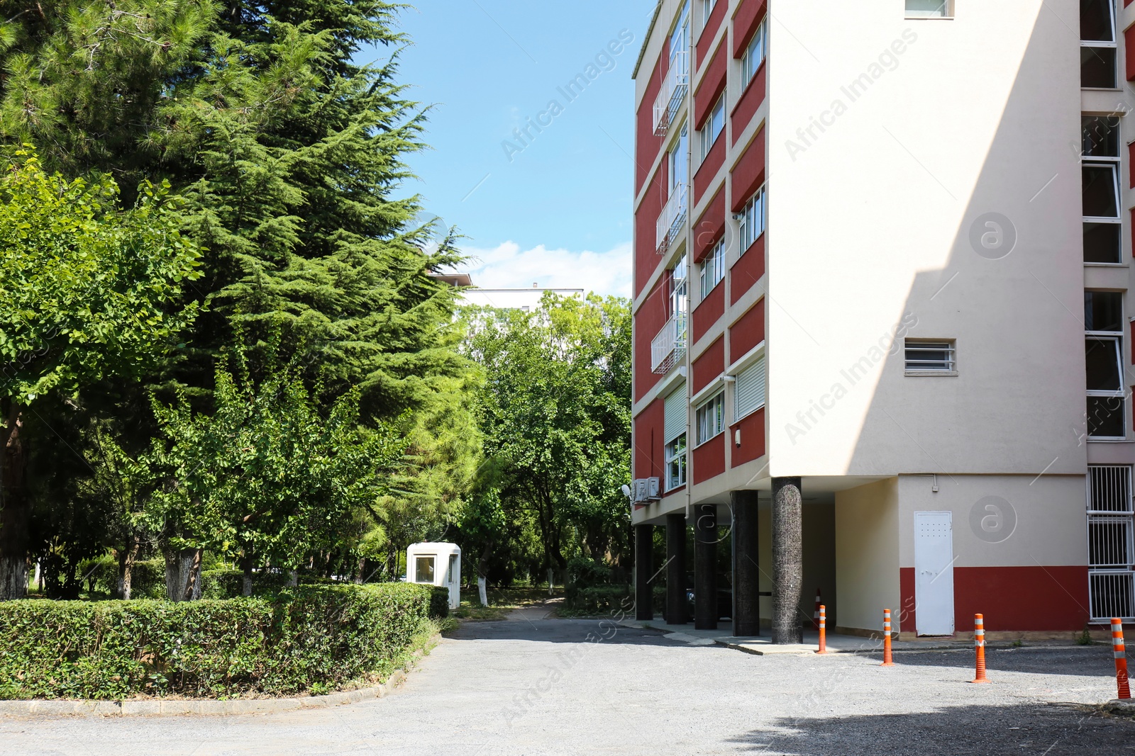 Photo of Beautiful view of city street with apartment building