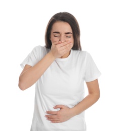 Photo of Young woman suffering from stomach ache and nausea on white background. Food poisoning