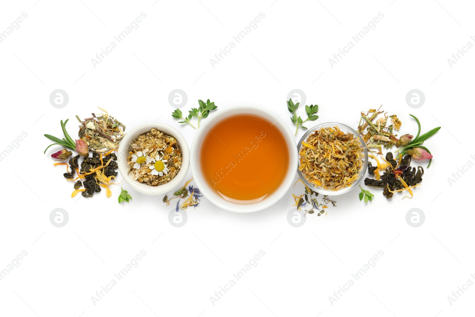 Photo of Composition with freshly brewed tea and dry leaves on white background, top view