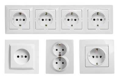 Image of Set with plastic power sockets on white background