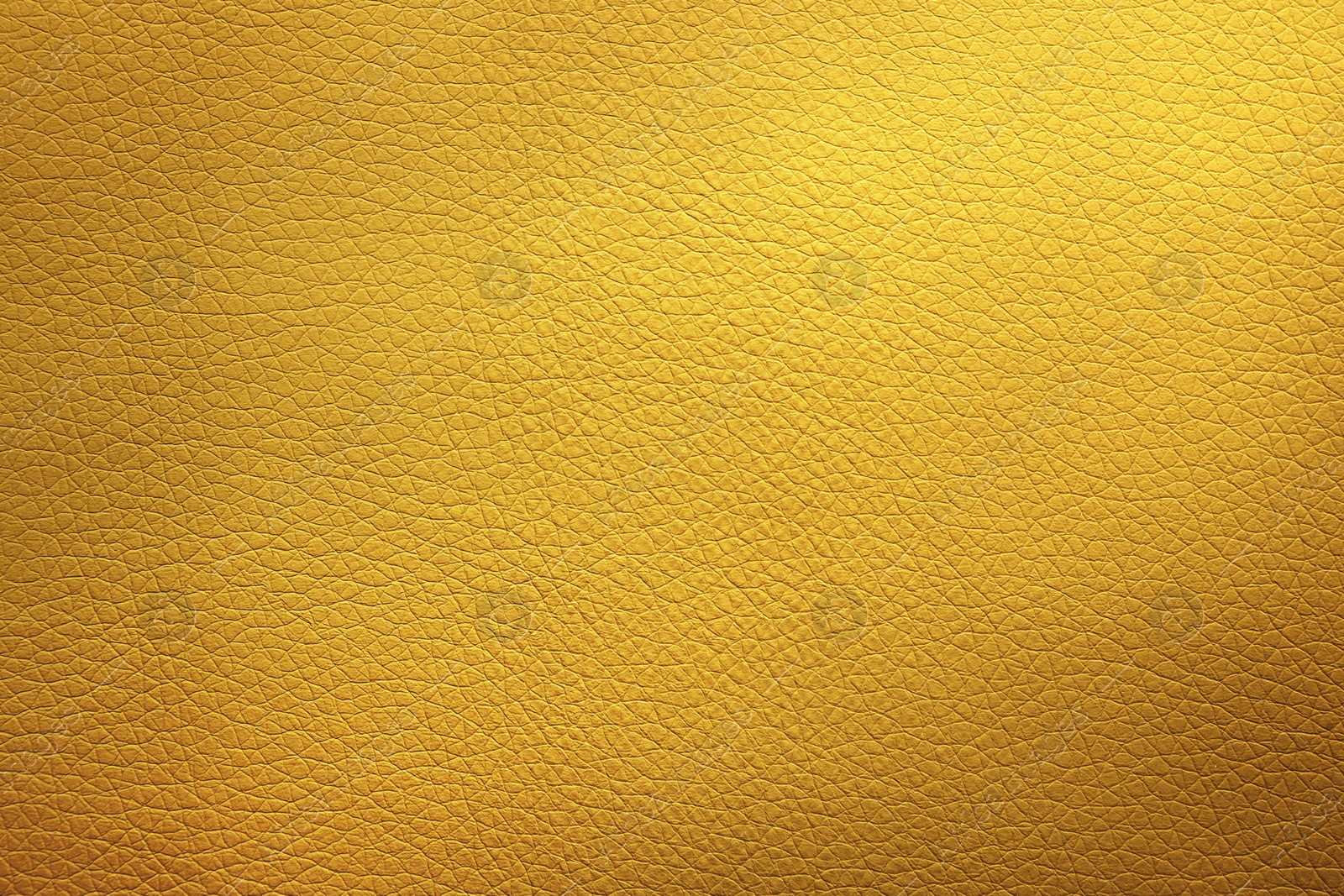 Image of Golden textured surface as background, closeup view