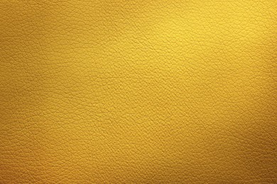 Image of Golden textured surface as background, closeup view