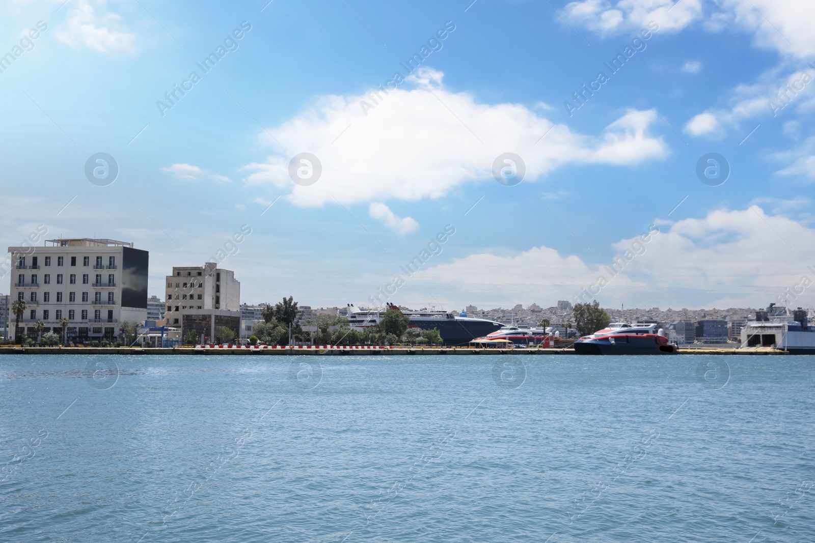 Photo of Picturesque view of port with modern boats on sunny day