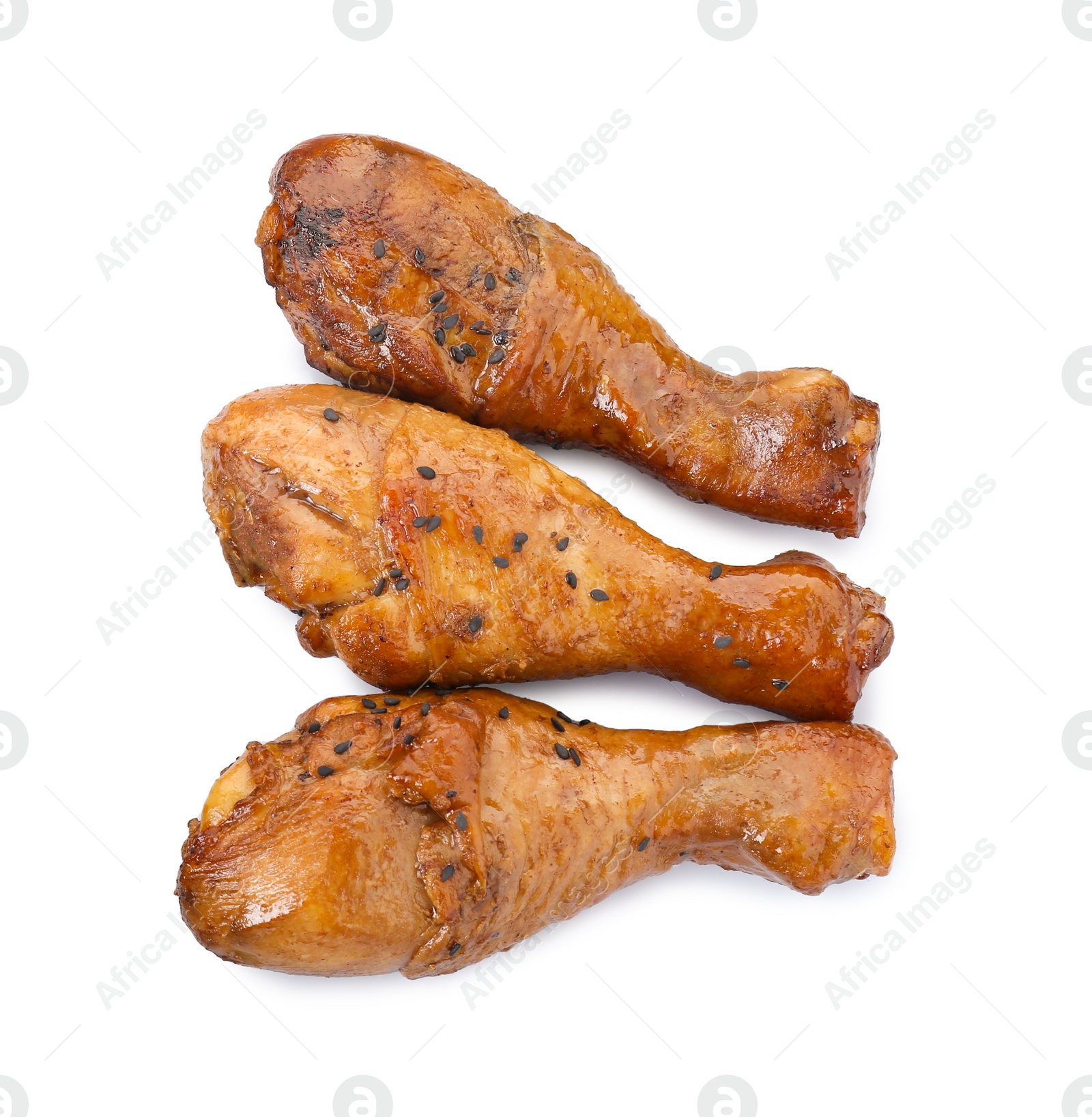 Photo of Chicken legs glazed with soy sauce isolated on white, top view