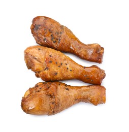 Photo of Chicken legs glazed with soy sauce isolated on white, top view