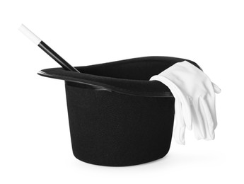 Photo of Black top hat, gloves and wand isolated on white. Magician equipment