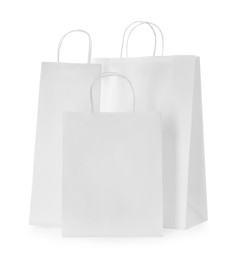 Photo of Three new paper bags isolated on white