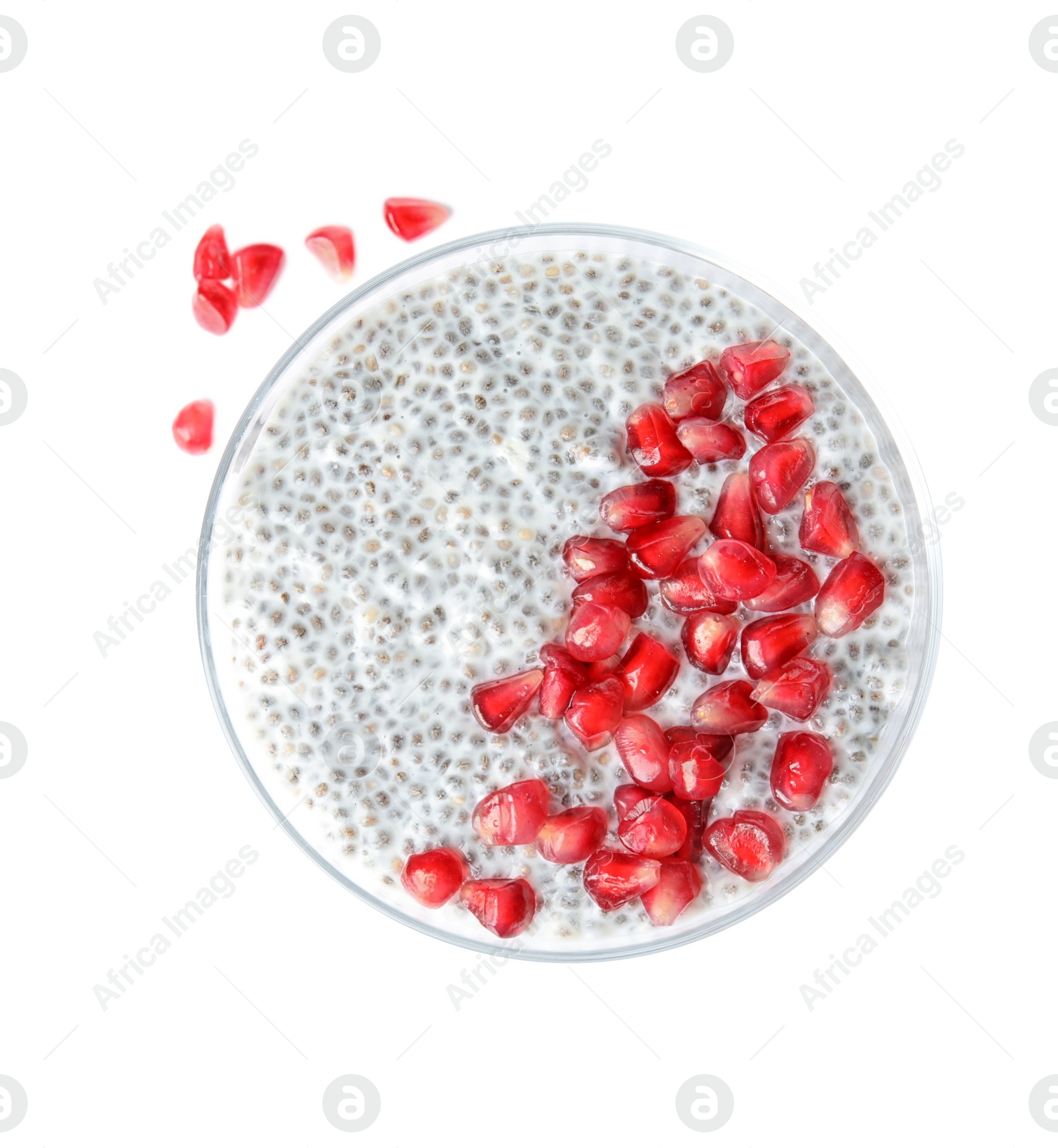 Photo of Dessert bowl of tasty chia seed pudding with pomegranate on white background, top view