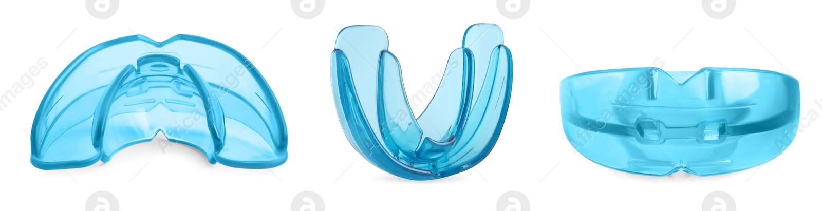 Image of Set with mouth guards on white background, banner design. Bite correction treatment