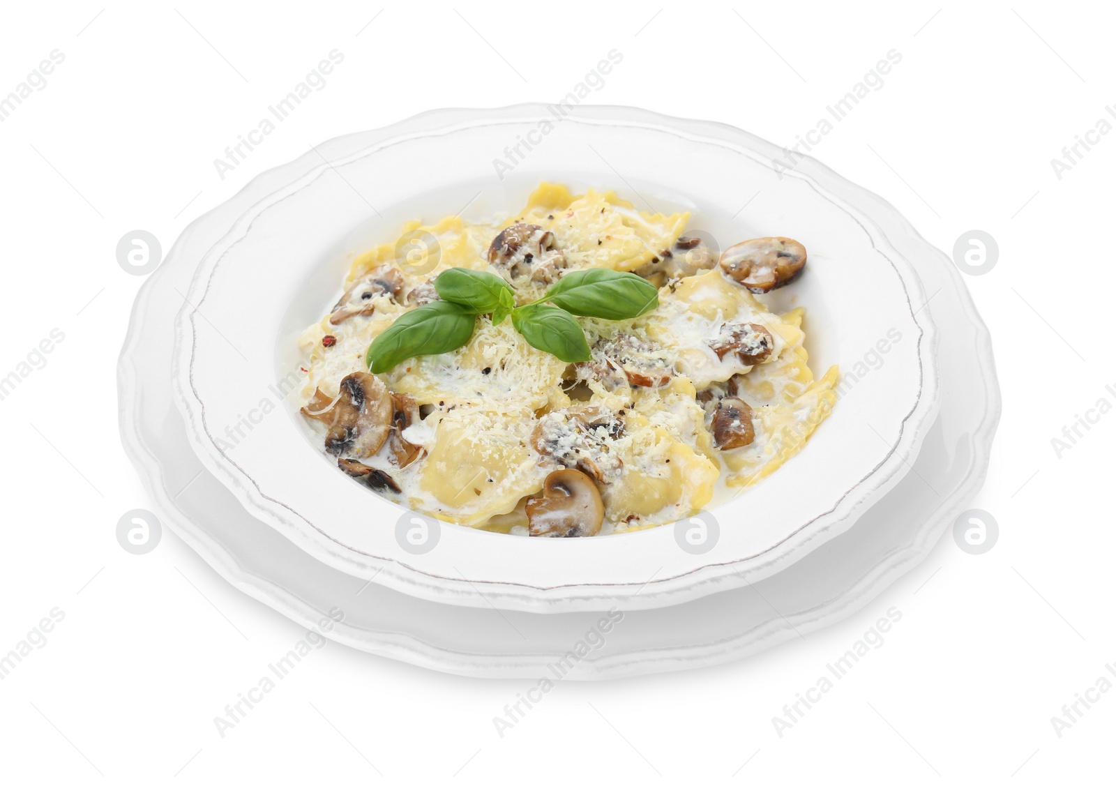 Photo of Delicious ravioli with tasty sauce and mushrooms isolated on white