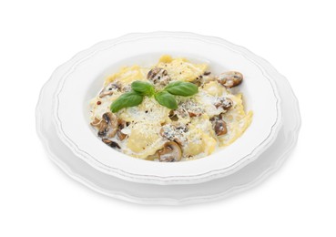 Delicious ravioli with tasty sauce and mushrooms isolated on white