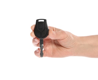 Photo of Woman holding car key on white background, closeup. Getting driving license